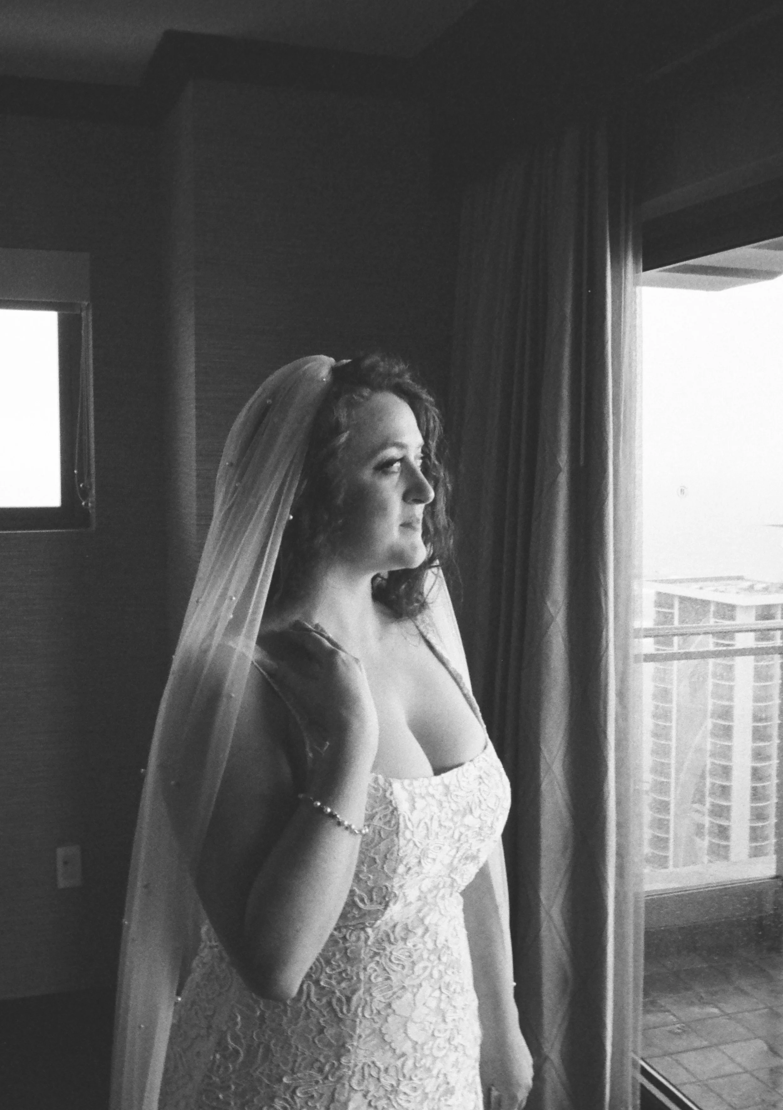 Couple intimate wedding portrait shot on 35mm film in Oahu Hawaii.