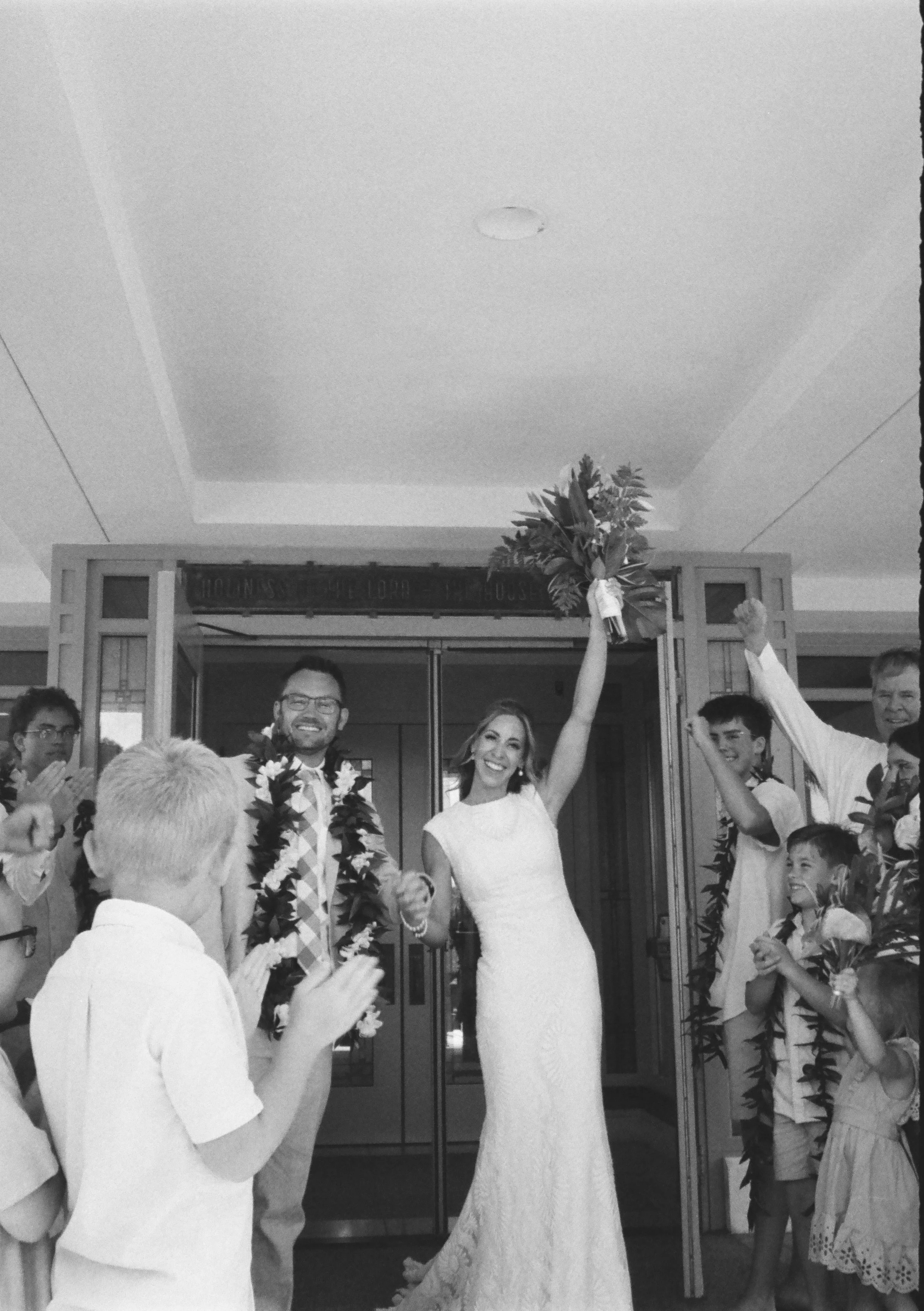Couple intimate wedding portrait shot on 35mm film in Oahu Hawaii.