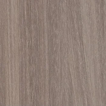 Close-up of a textured, light brown wood surface