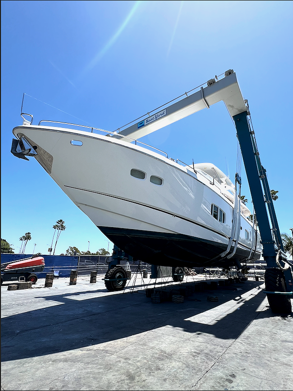 Yacht management handling yacht haul out at ship yard, yacht about to enter ship yard for repairs and annual maintenance