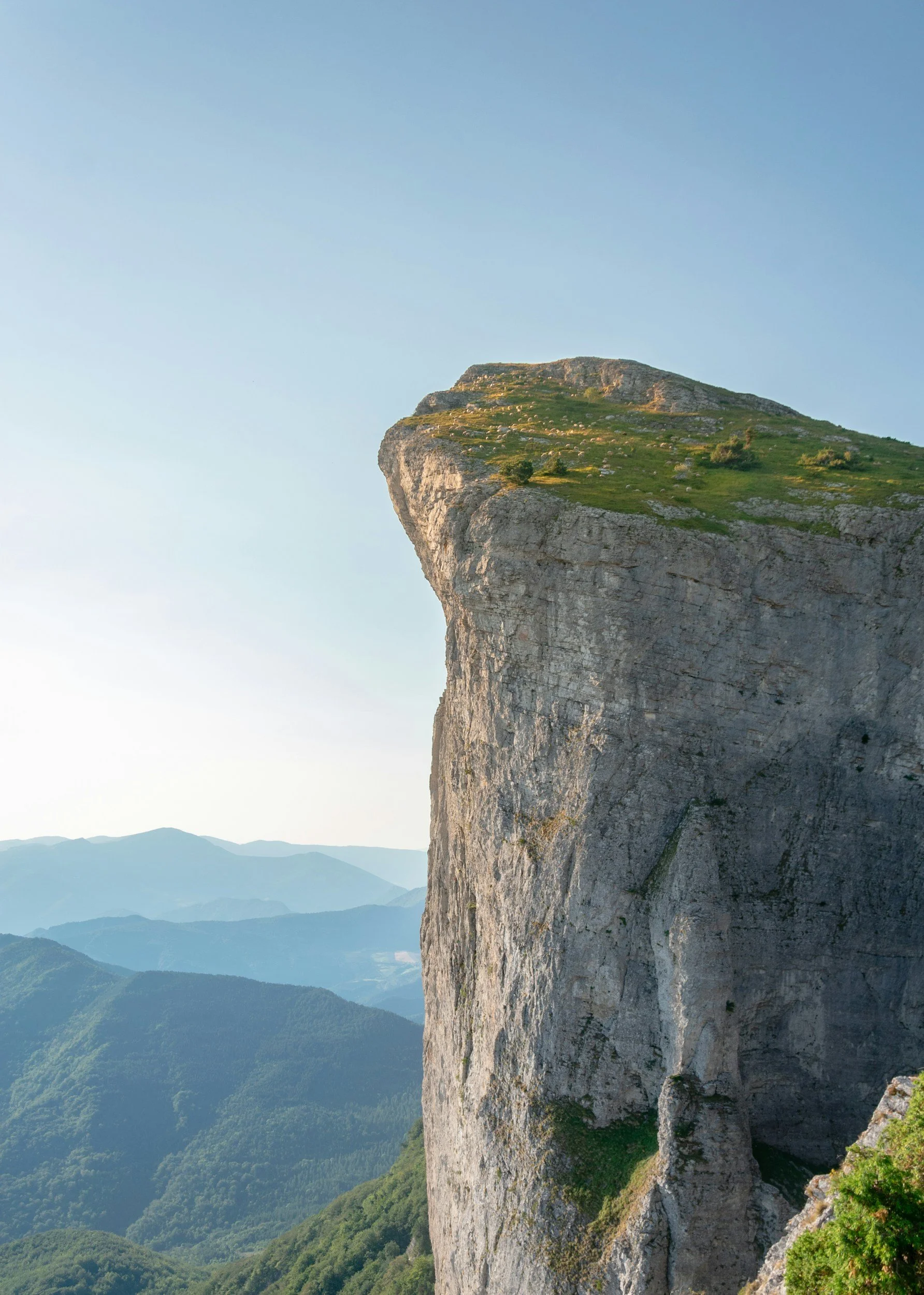 Steep mountain cliff symbolizing the courage to untangle religious enmeshment and faith-based narcissism