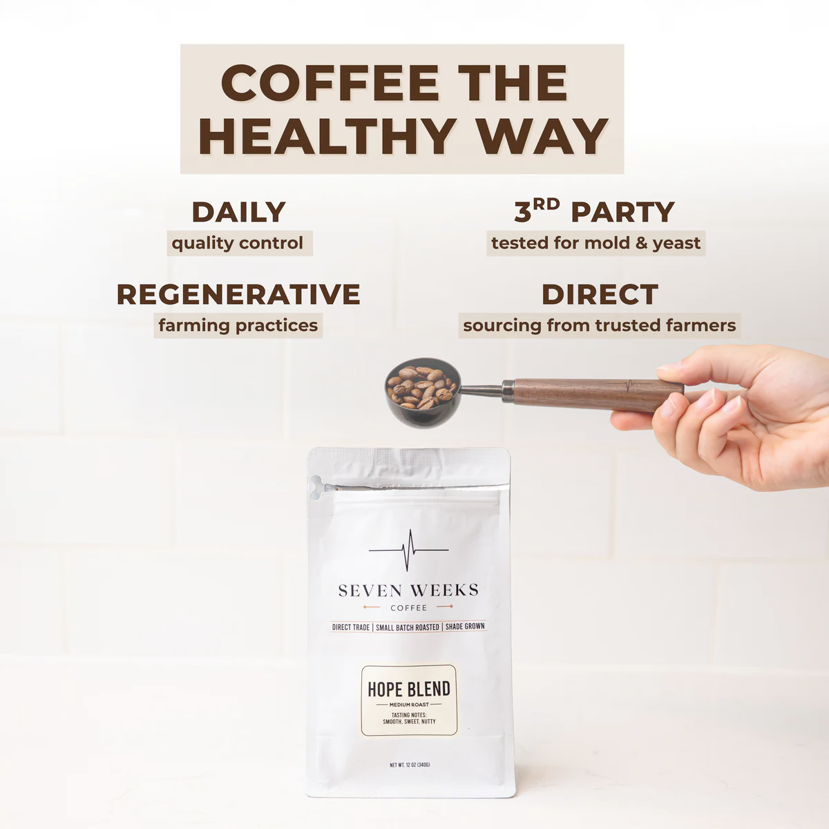 A package of Seven Weeks Hope Blend coffee with descriptions promoting healthy coffee practices, including daily quality control, regenerative farming practices, third-party mold and yeast testing, and sourcing from trusted farmers, with a hand holding a scoop of coffee beans.