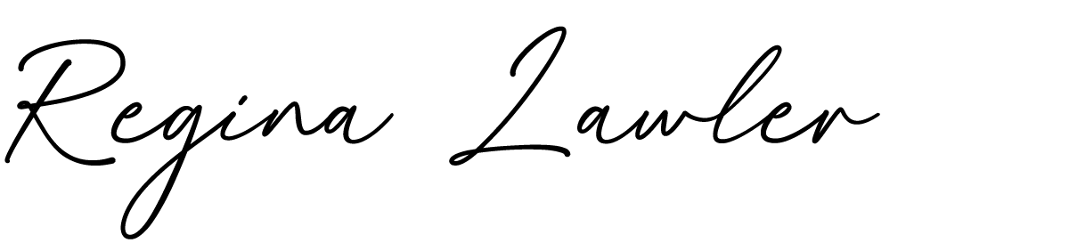 People sitting at a conference table in a meeting room.