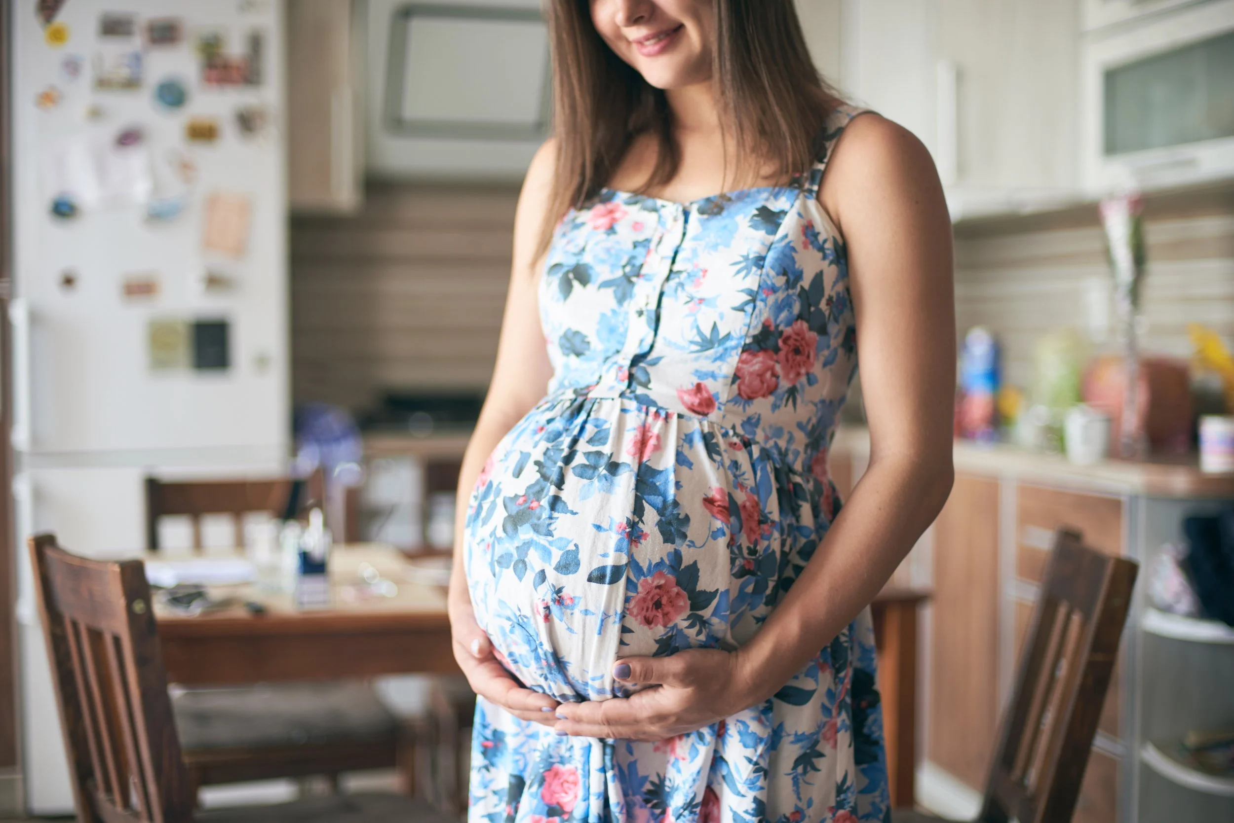 Young pregnant woman anticipating her baby