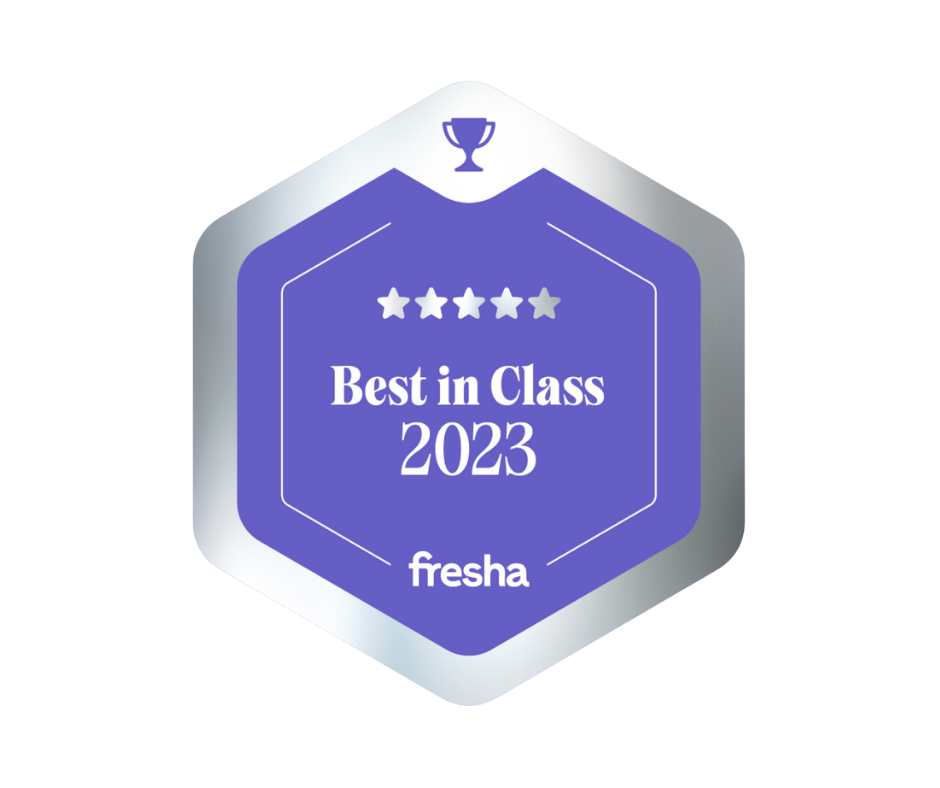 A purple and silver badge with the words "Best in Class 2023"