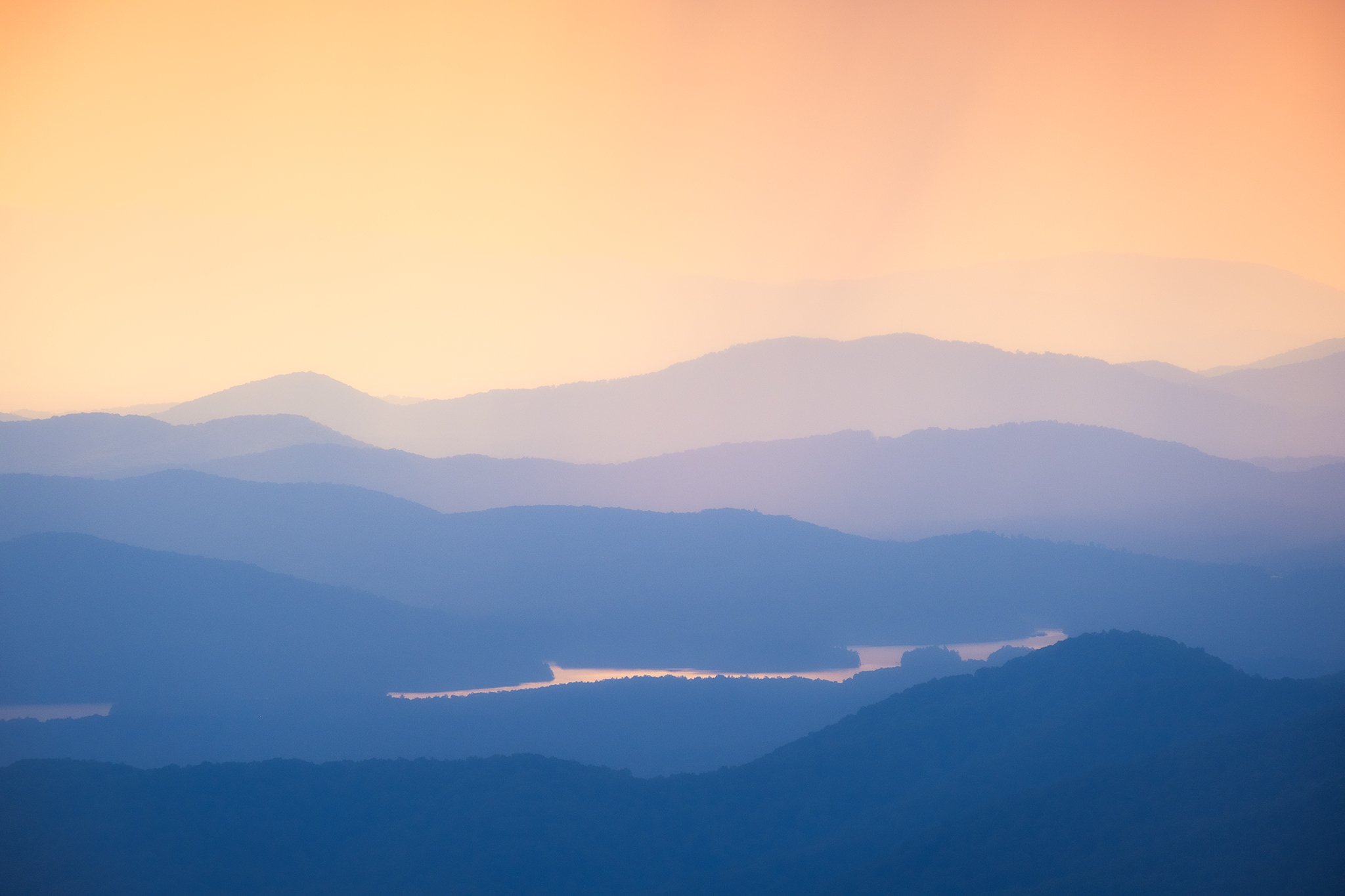 Layers of the Blue Ridge Mountains of Georgia at sunset after heavy rainfall