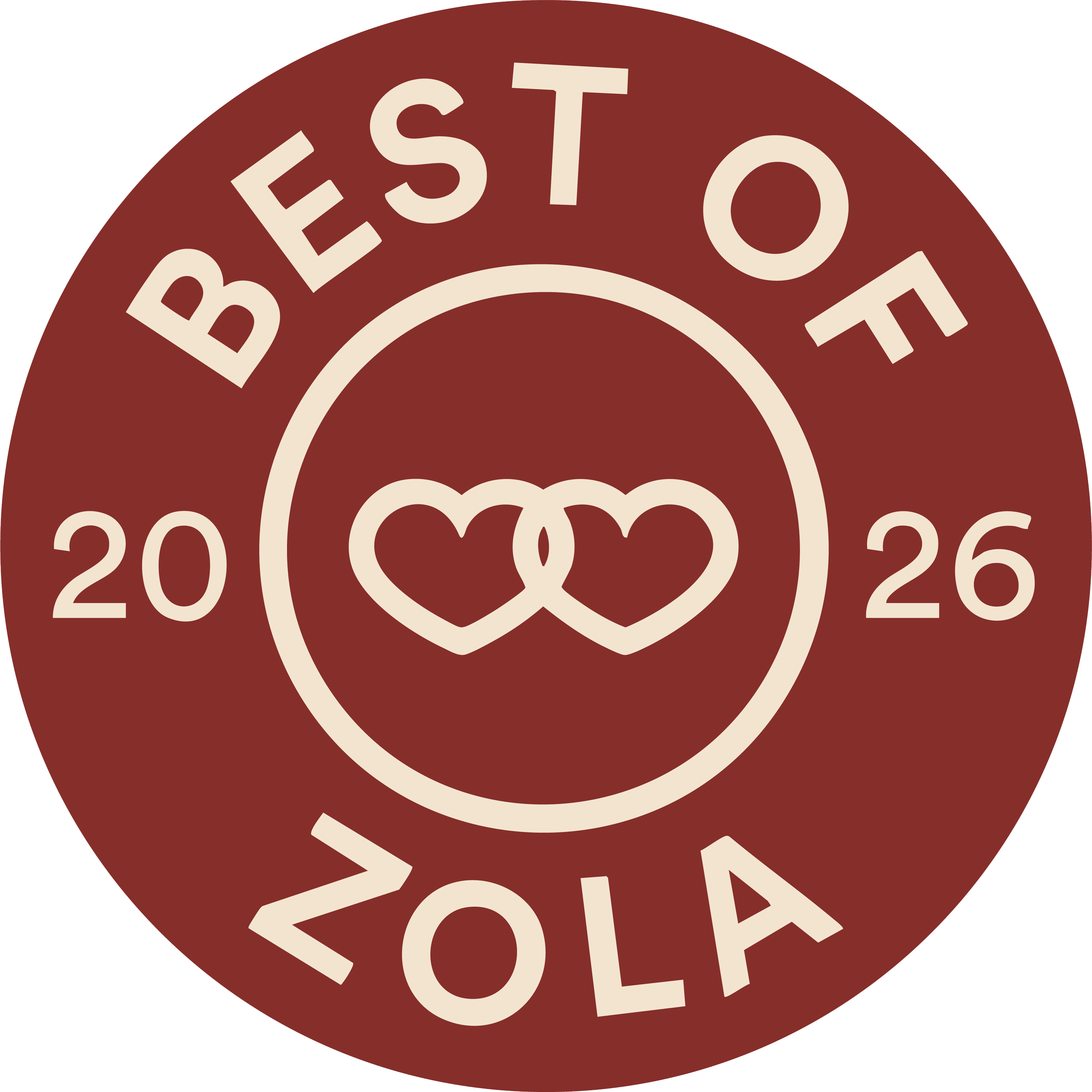 A circular burgundy badge with the words 'Best of Zola' and the year '2026' written around the edge in beige, featuring two intertwined beige hearts in the center.