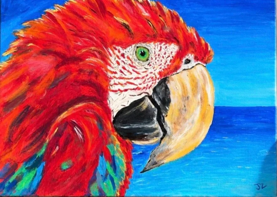 Painting of a colorful parrot with a large yellow beak, green eye, red and green feathers, set against a blue sky and ocean background.