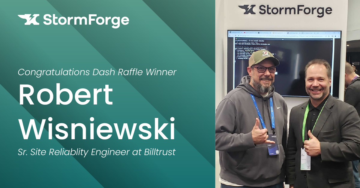 Digital award screen from StormForge recognizing Robert Wisniewski as the dash raffle winner, with two men smiling and giving thumbs up at a conference event.