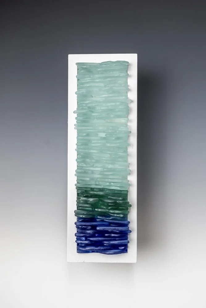 Upcycled spirit and wine bottles hand dyed and made in Puerto Rico