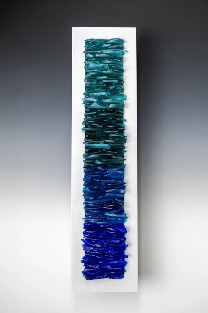 Made by Stacy Howell from upcycled alcohol bottles for hotels