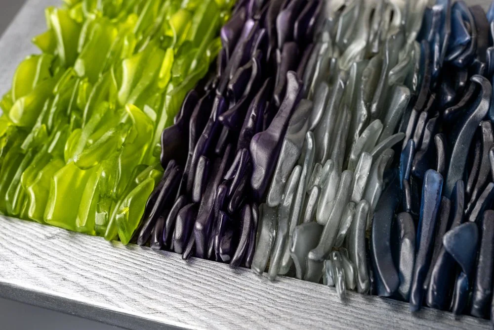 Upcycled spirit and wine bottles hand dyed and made in Puerto Rico