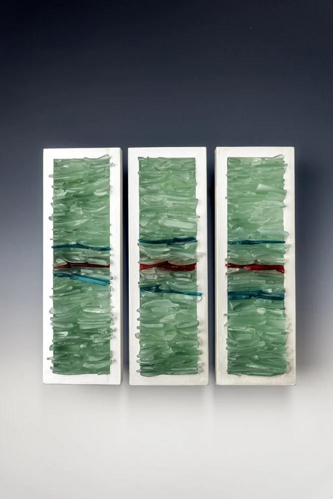 Upcycled spirit and wine bottles hand dyed and made in Puerto Rico