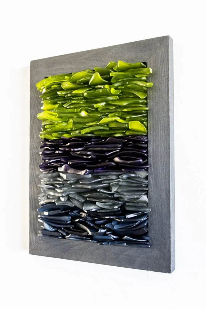 Upcycled spirit and wine bottles hand dyed and made in Puerto Rico