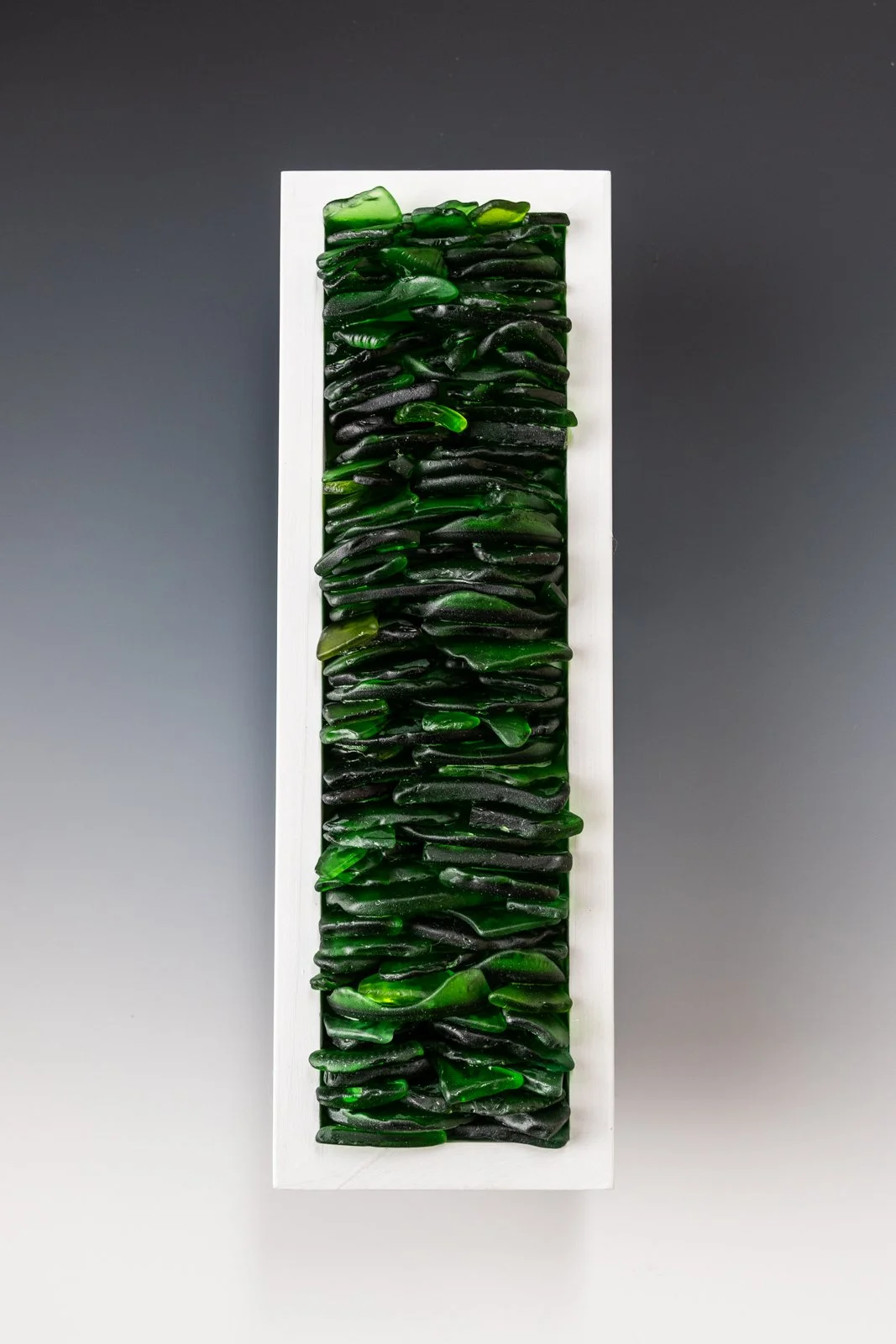 Found green sea glass turned into a wall hanging gathered from the shores in Puerto Rico 