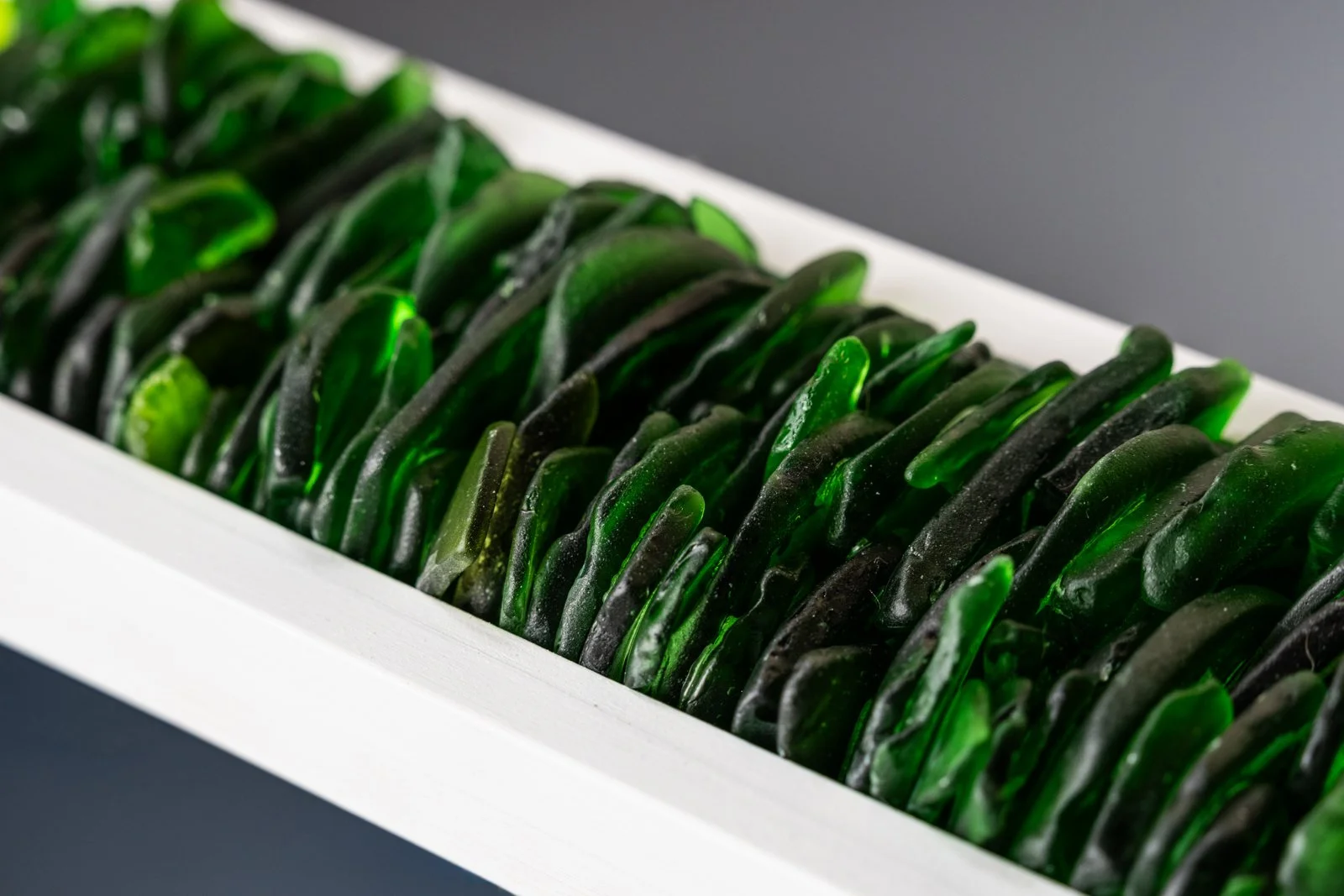 Found green sea glass turned into a wall hanging gathered from the shores in Puerto Rico