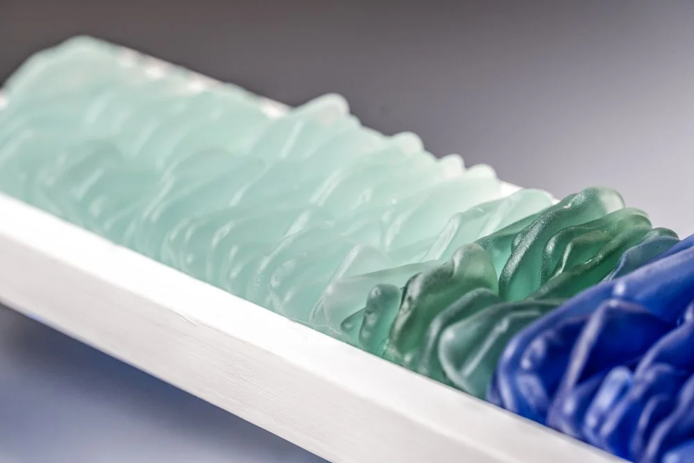 Upcycled spirit and wine bottles hand dyed and made in Puerto Rico