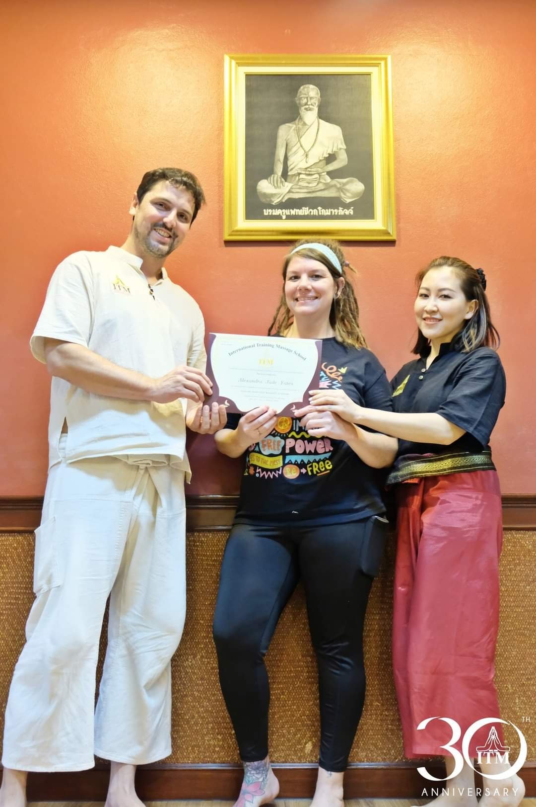 Study abroad trip to Chiang Mai Thailand in 2023. Jade receiving a certificate of completion for a Thai Massage class at ITM in Chiang Mai, Thailand.