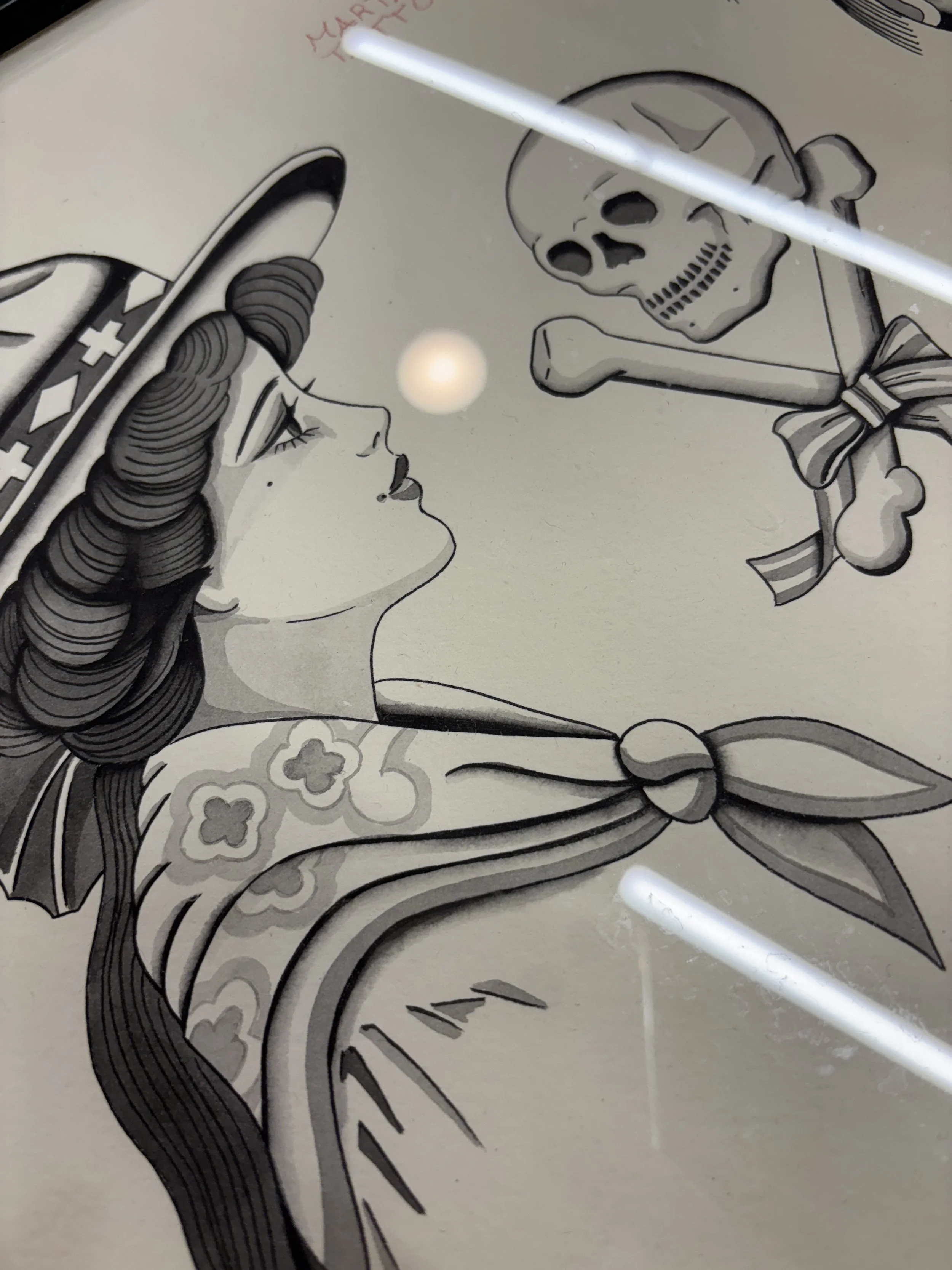 Black and white illustration of Dorothy from The Wizard of Oz with a skeleton with a bowtie and bones, facing each other.