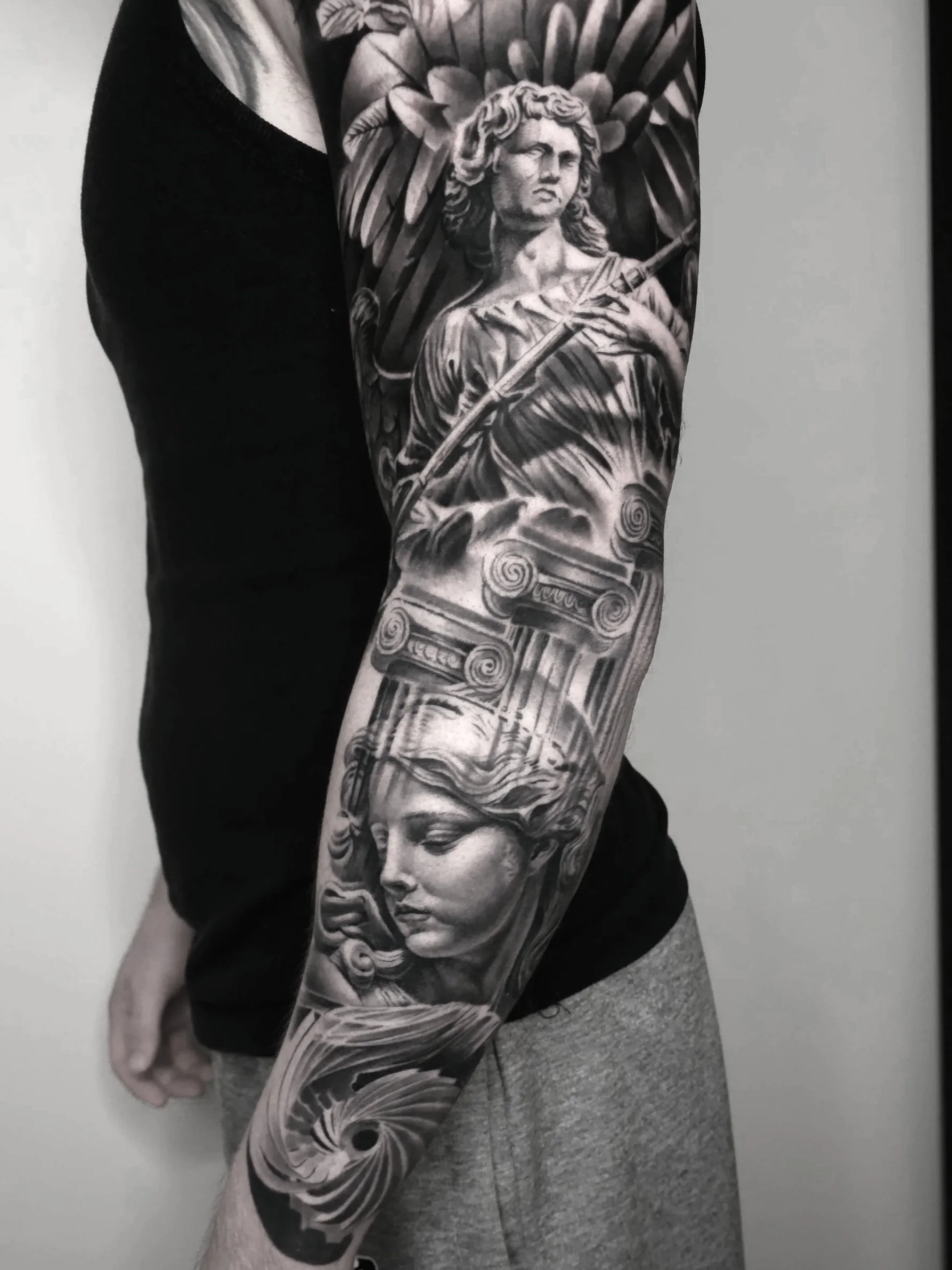 blackandgrey-Realism-angel-tattoo-sleeve-chicago.jpg