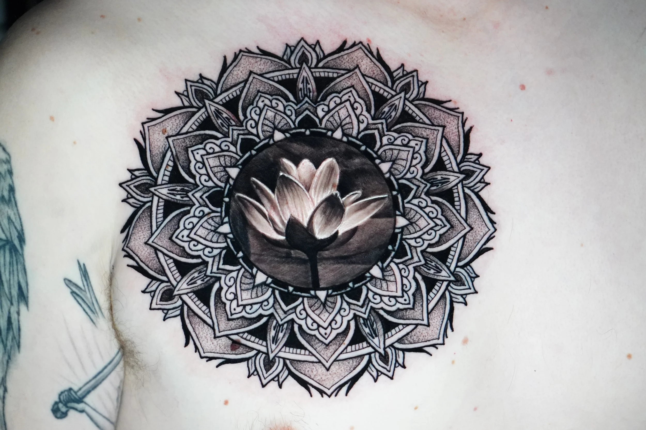 geometric-mandala-flower-chest-tattoo-chicago.JPG