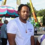 Devonjea Green a barber from Off Top Barbershop.