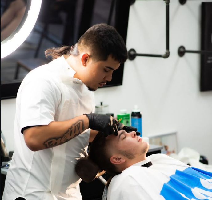 Ricky Hernandez, owner of Off Top Barbershop.