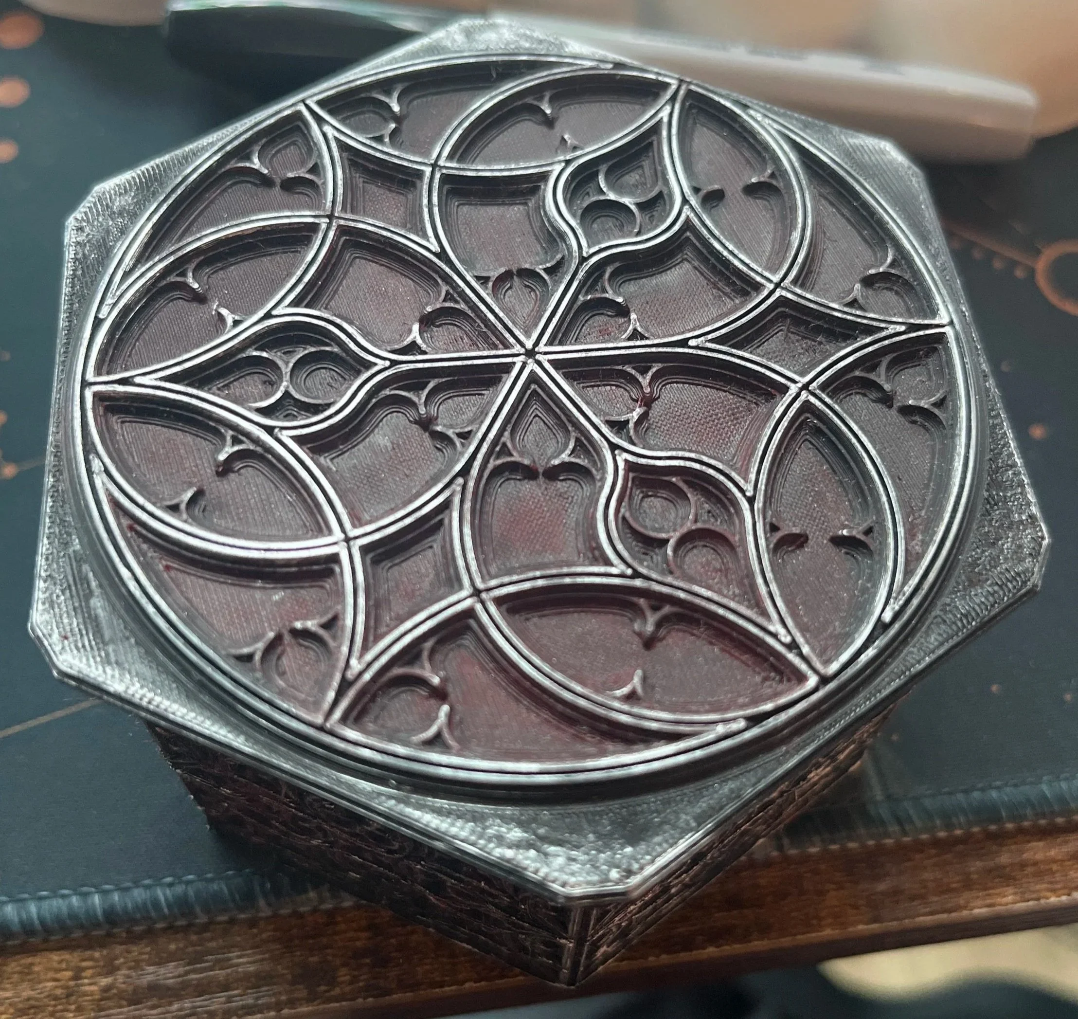 The box would be good for storing small items such as dice, as a dice tray, or as just a decoration. 