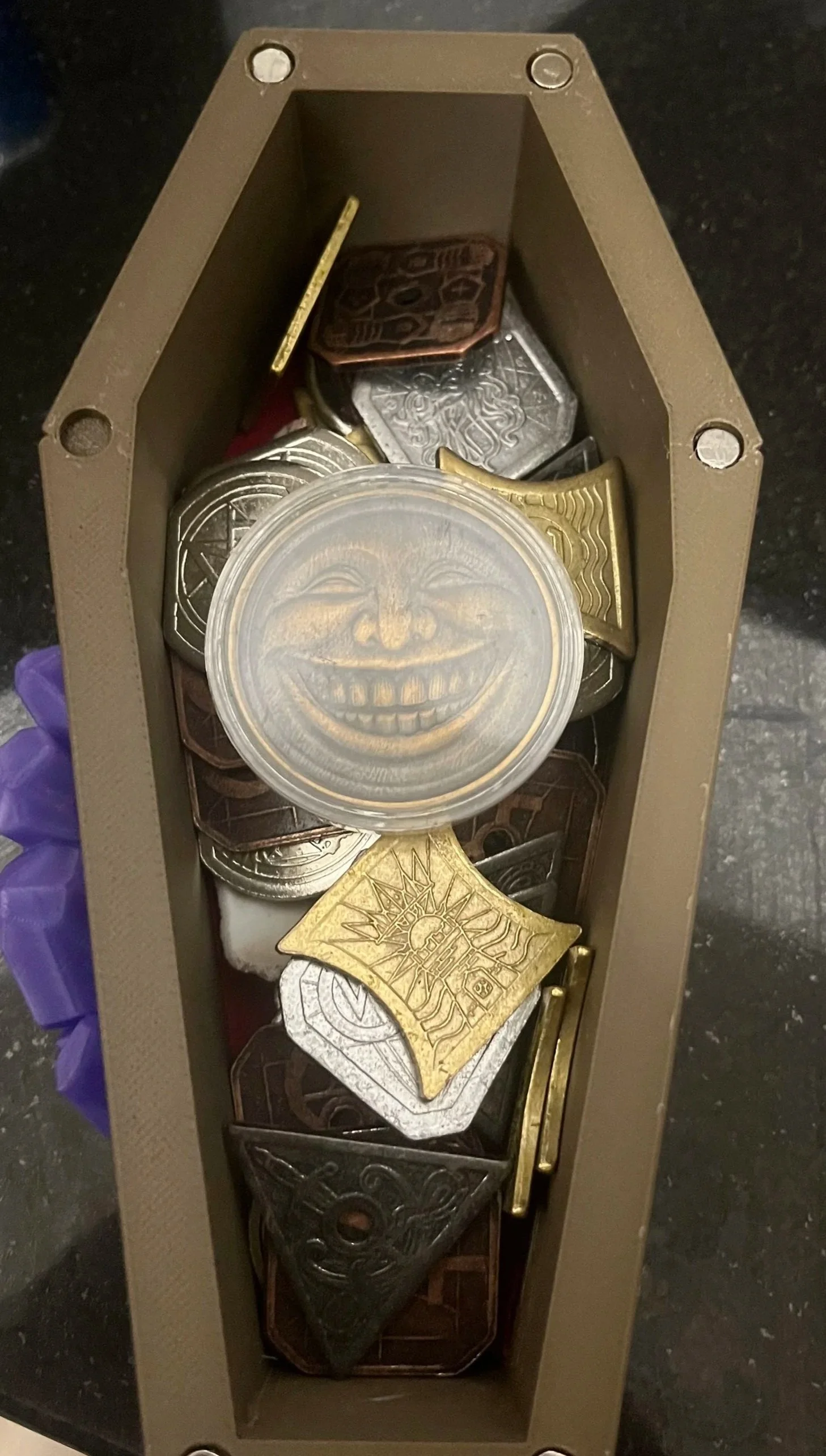 How the actual gift (the coin) was presented.