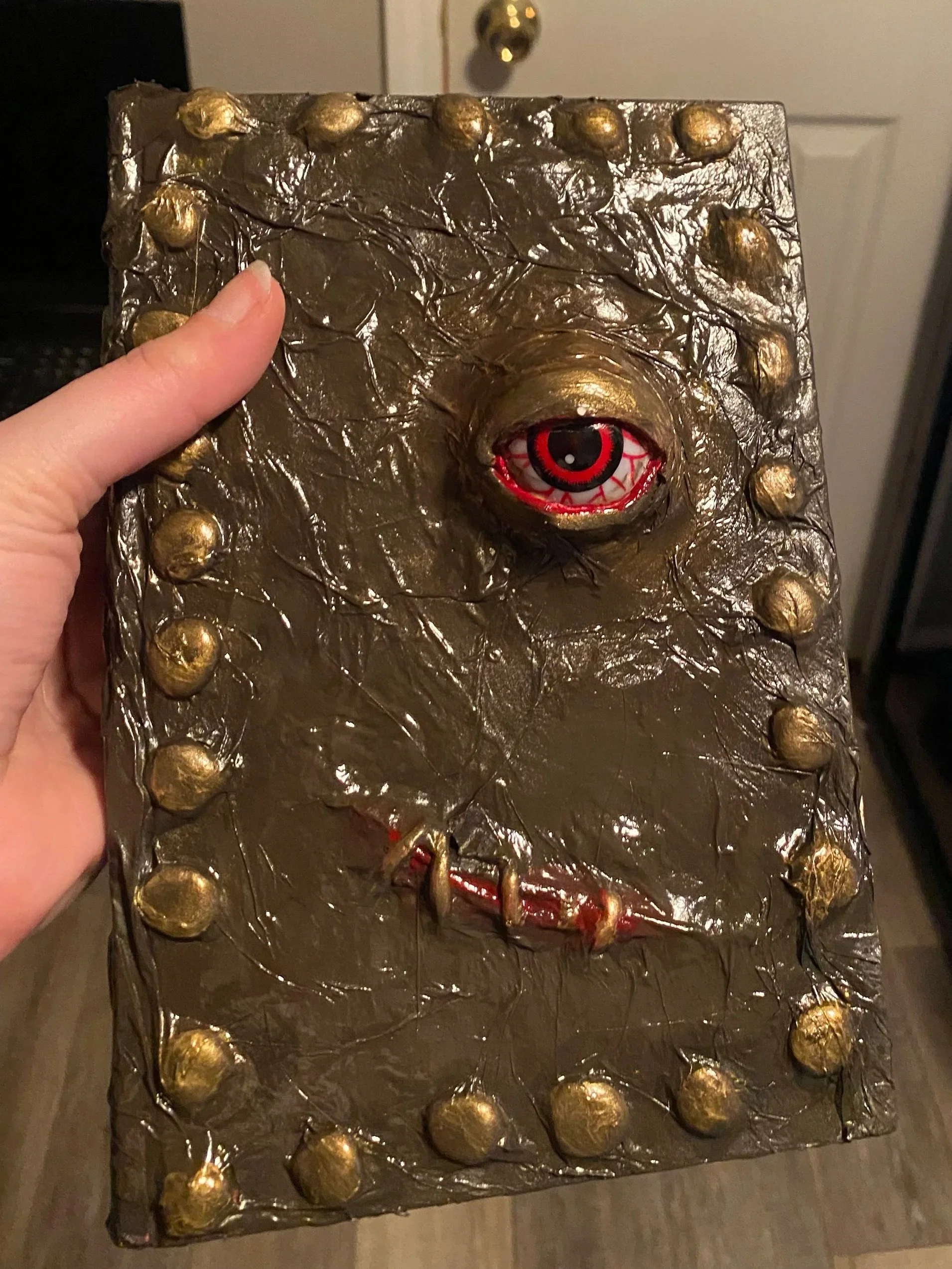 Experimented with different materials and tried my hand at a cursed spell book inspired design. 