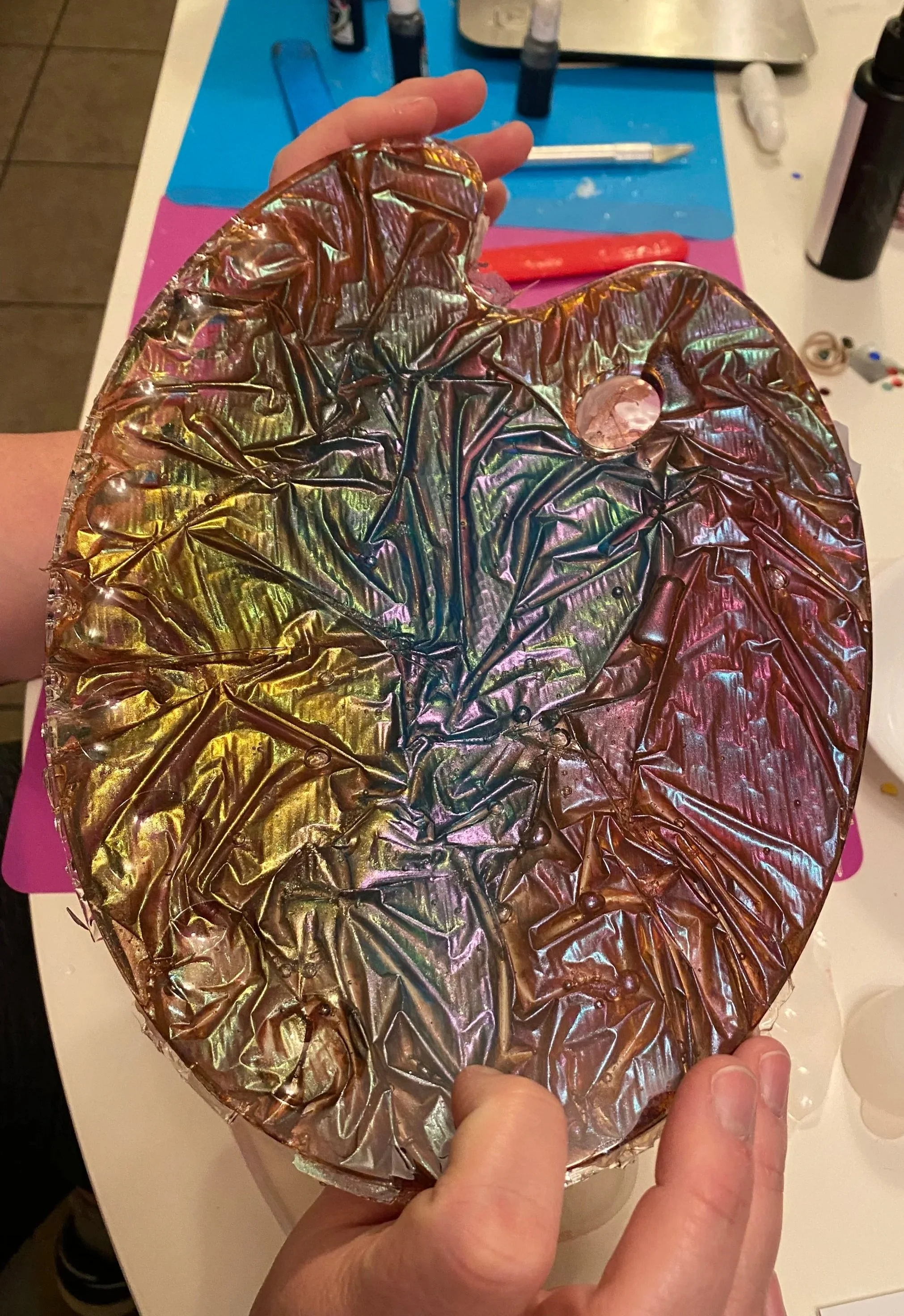 When I was doing a lot of resin work, this was my attempt at the velvet/fabric effect on a paint pallet. 