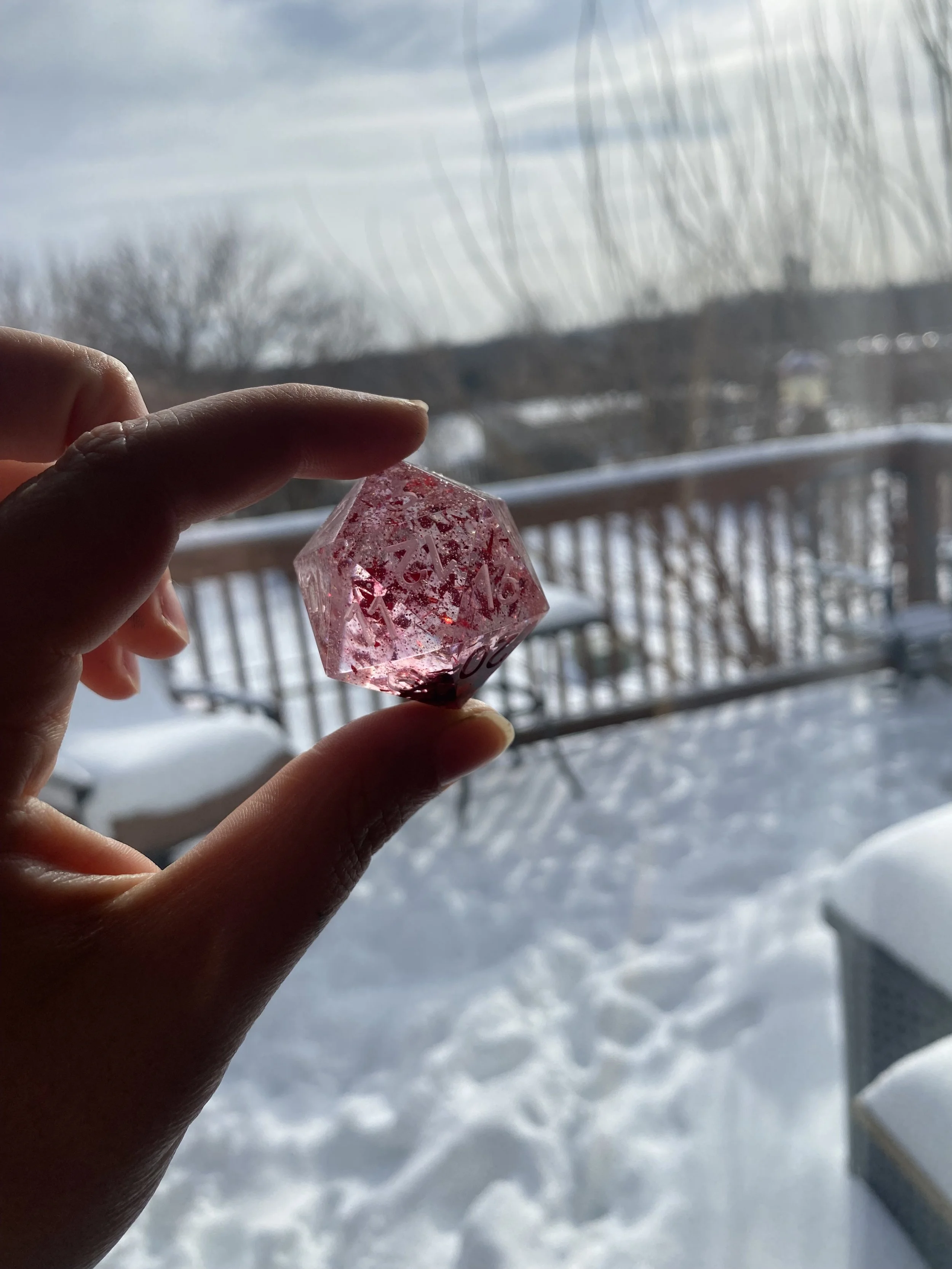 This was a set I made on a whim with some left over material. Only the D20 came out well, but it looked great through the light. 