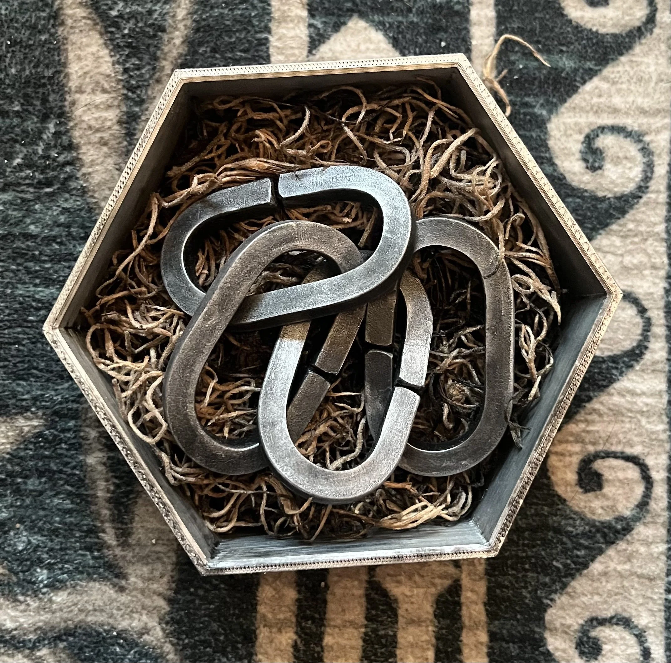 How the actual gift (the chain) was presented.