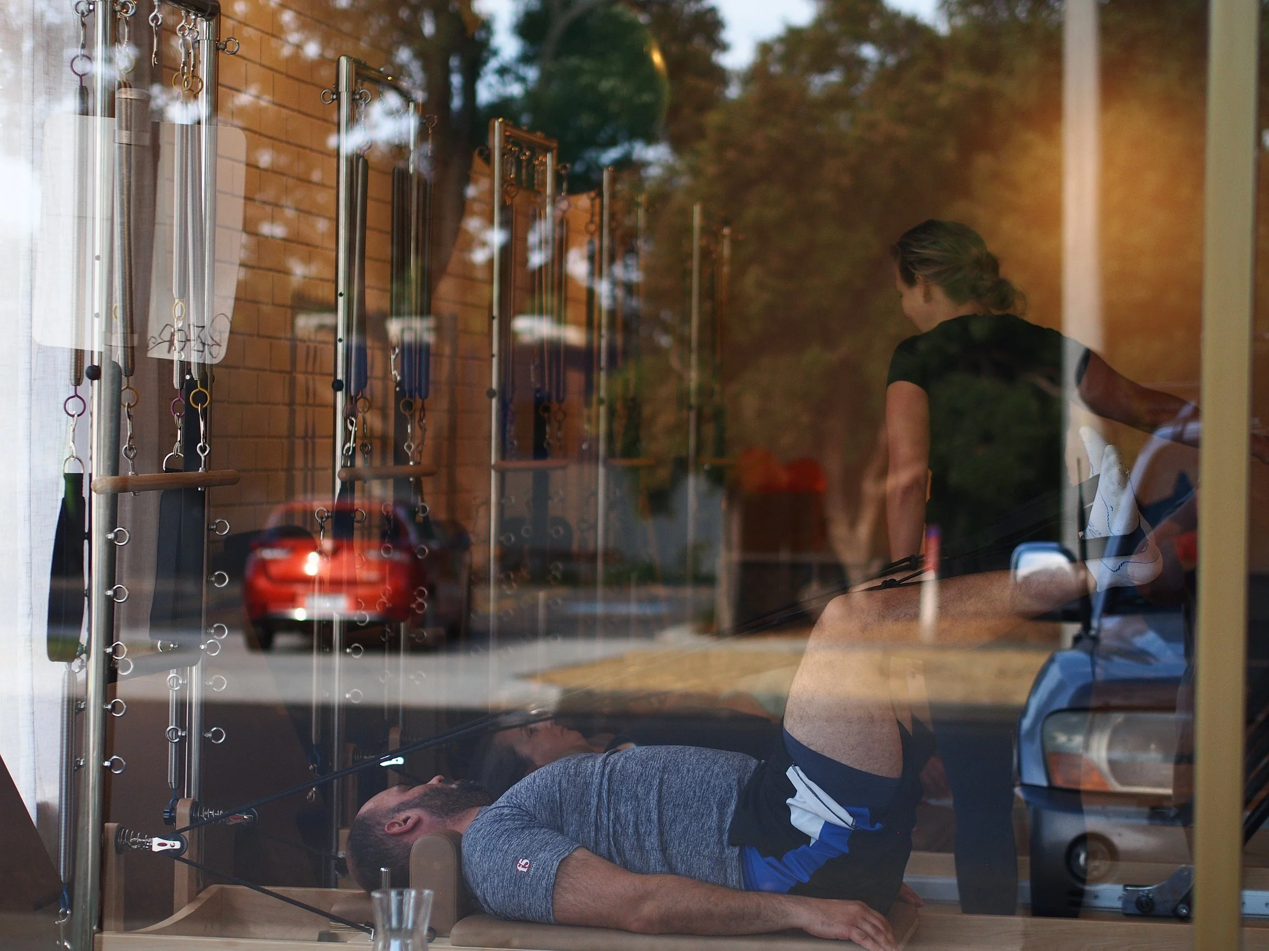 Reformergroup small-group class visible through the window of Pilates Lab Phillip Island