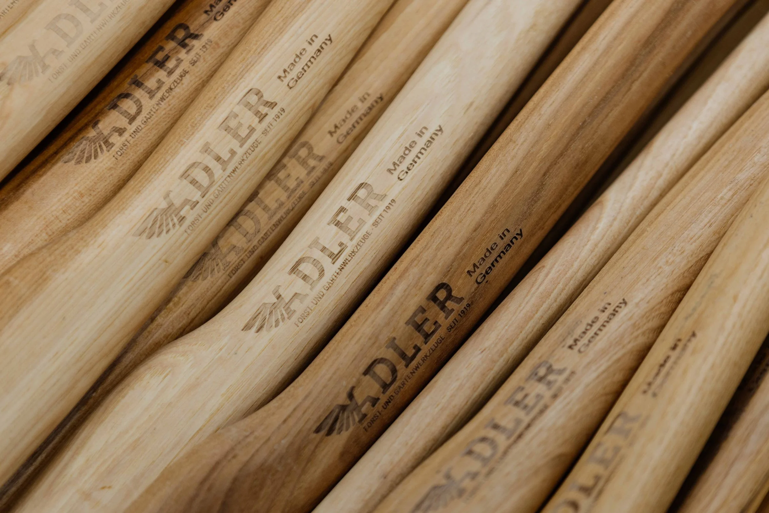 Close-up of wooden sticks with 'Made in Germany' and 'Forel' branded on them.