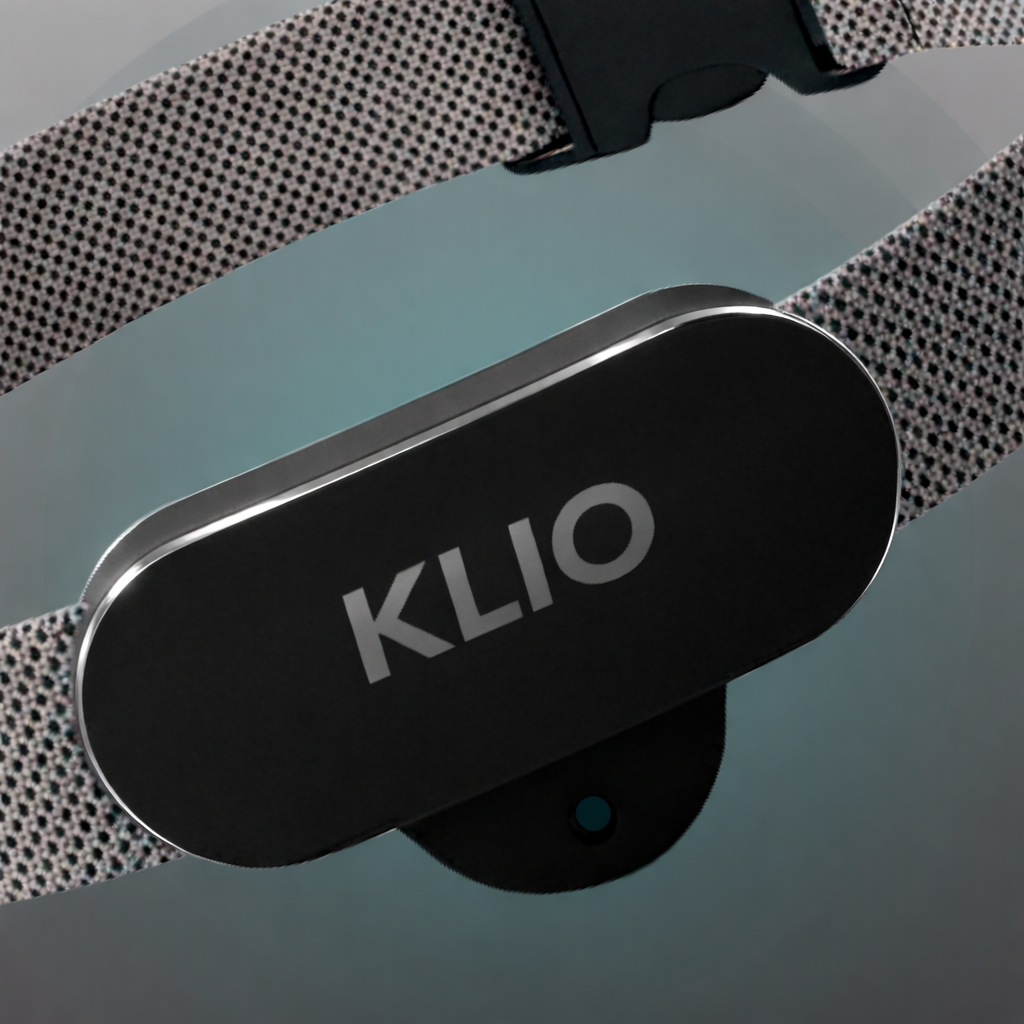 Close-up of a pair of headphones with a black oval-shaped logo that reads 'KLIO' in white letters.
