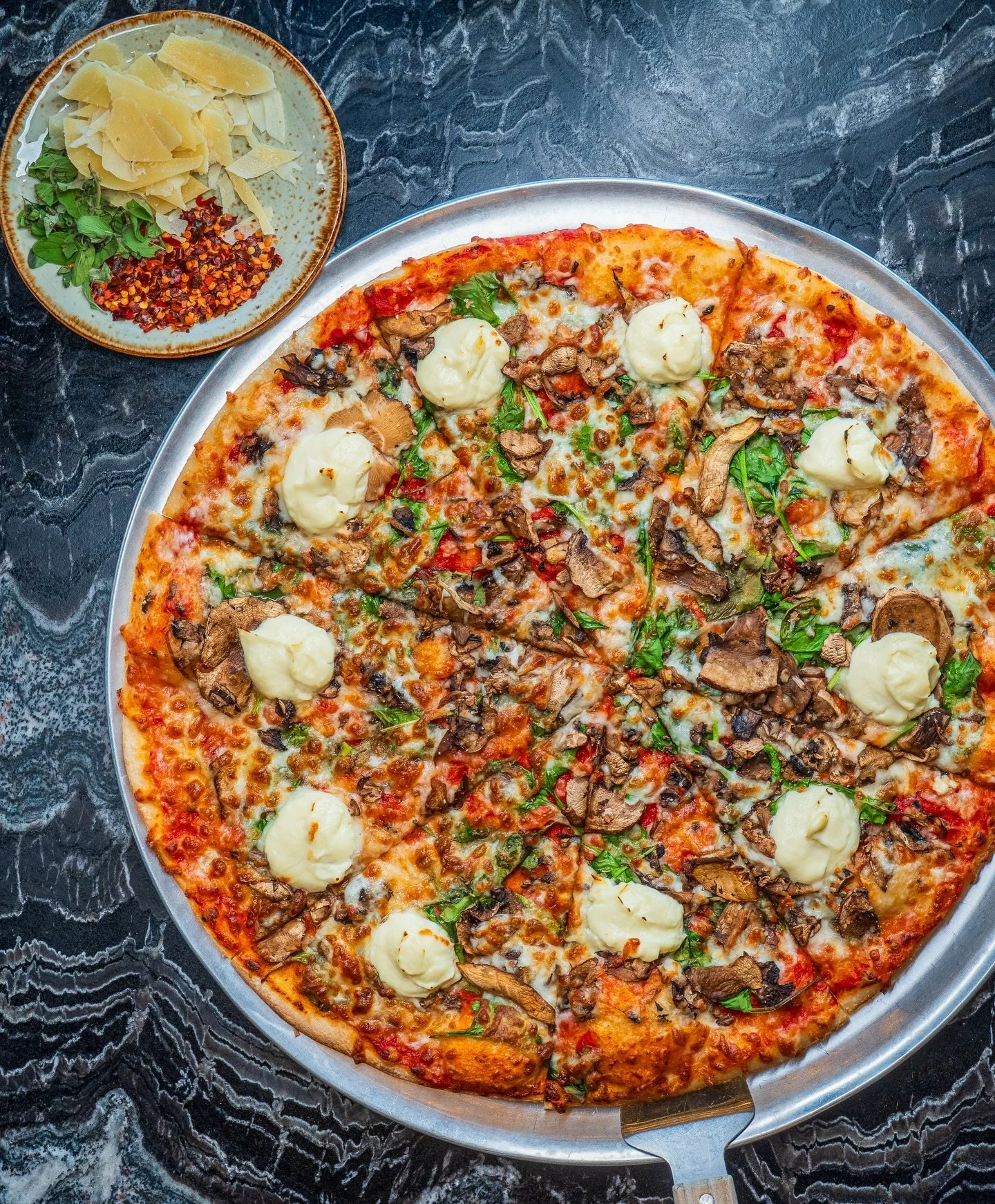Our mushroom pizza is showing off today! And it is so tasty! Have you tried yet? 
Made with baby portobello, shitake, button mushrooms, spinach, rosemary &amp; whipped riccota.

#pizza #pizzaplace #lovemushrooms #houstonrestaurants #houstonfood