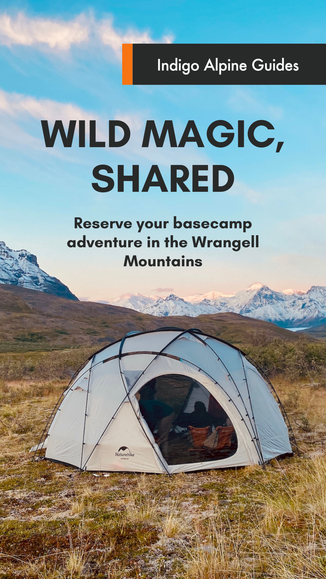 A camping tent set up in a mountainous landscape with snow-capped peaks in the background and a partly cloudy sky.