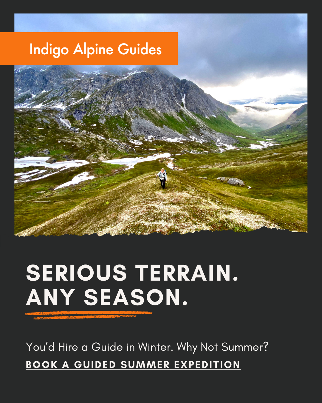 A hiker walking on a grassy trail in a mountainous landscape with snow patches, green slopes, and cloudy skies. The scene promotes guided mountain expeditions.