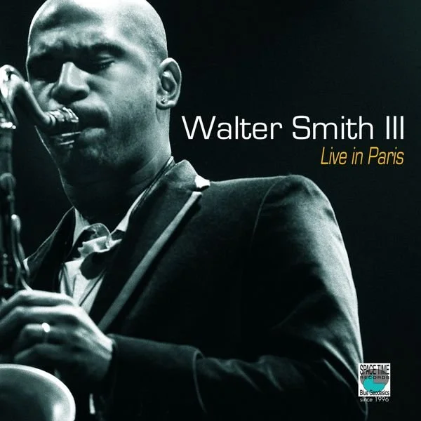 Black and white concert poster of Walter Smith III, a jazz musician, playing the saxophone live in Paris.