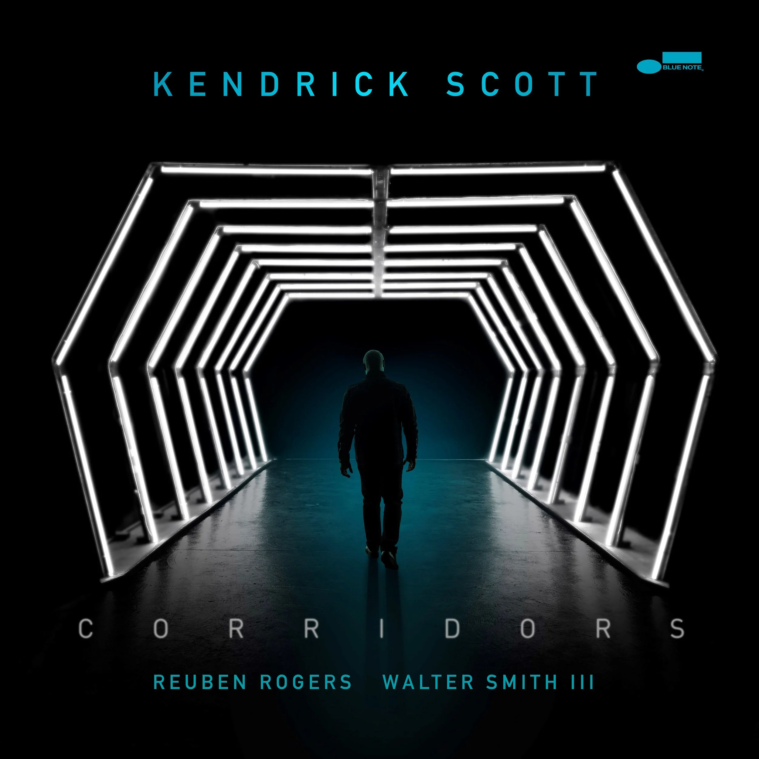 Album cover for Kendrick Scott's 'Corridors' featuring a silhouette of a person walking through a futuristic tunnel with neon lights.