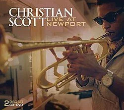 Christian Scott playing trumpet in a recording studio for a live performance at Newport, promotional poster with text.