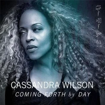 Promotional poster of actress Cassandra Wilson for her upcoming release 'Coming Forth By Day' showing her with curly hair and a serious expression.