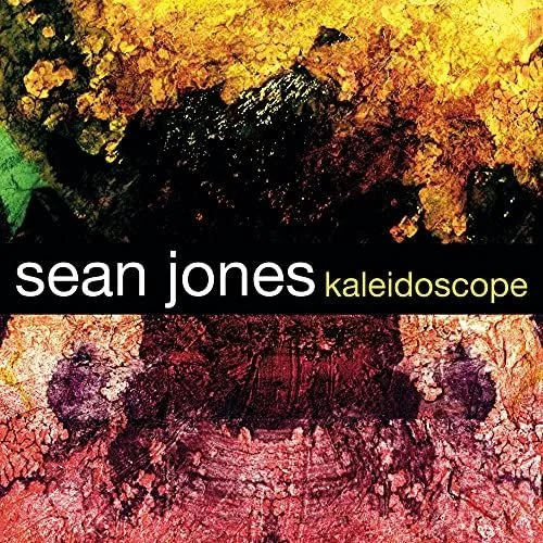 Cover art for Sean Jones' album Kaleidoscope featuring an abstract, textured background with shades of yellow, orange, pink, and black.