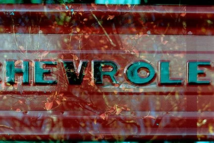 Double Exposed image of a Chevrolet Truck and Tree