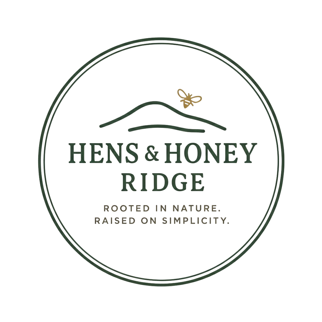 Logo for Hens & Honey Ridge featuring a mountain outline and a bee, with the tagline "Rooted in Nature. Raised on Simplicity."