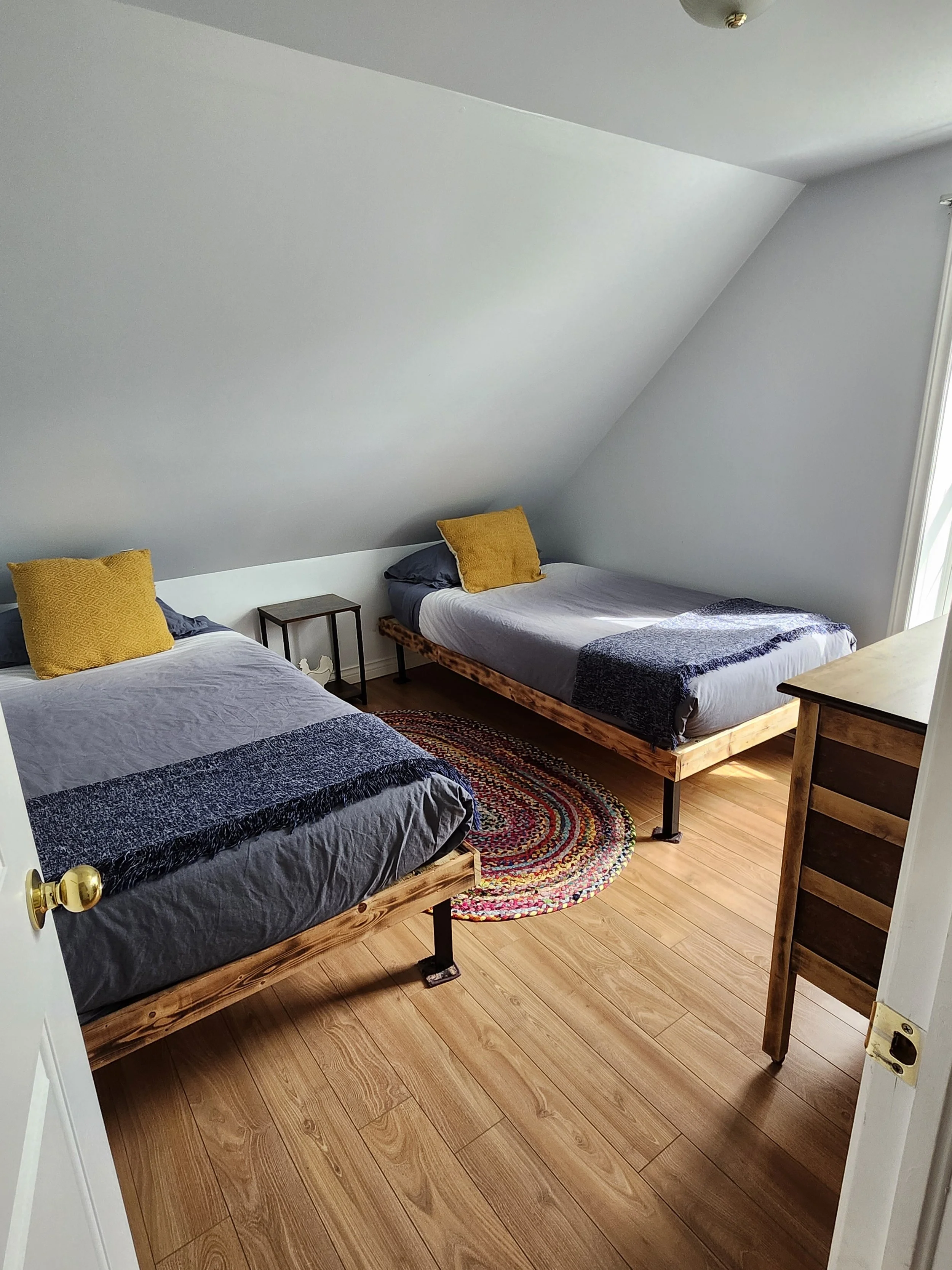 Cozy and bright, with twin beds made for restful nights and sweet mornings.