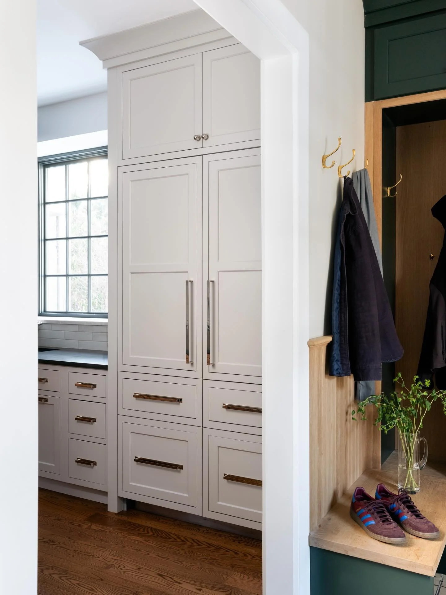 Mudroom 🤝🏼 Kitchen. The rear entry to the home starts with a semi-custom mudroom and opens to a grand kitchen. The perfect layout for an active family!