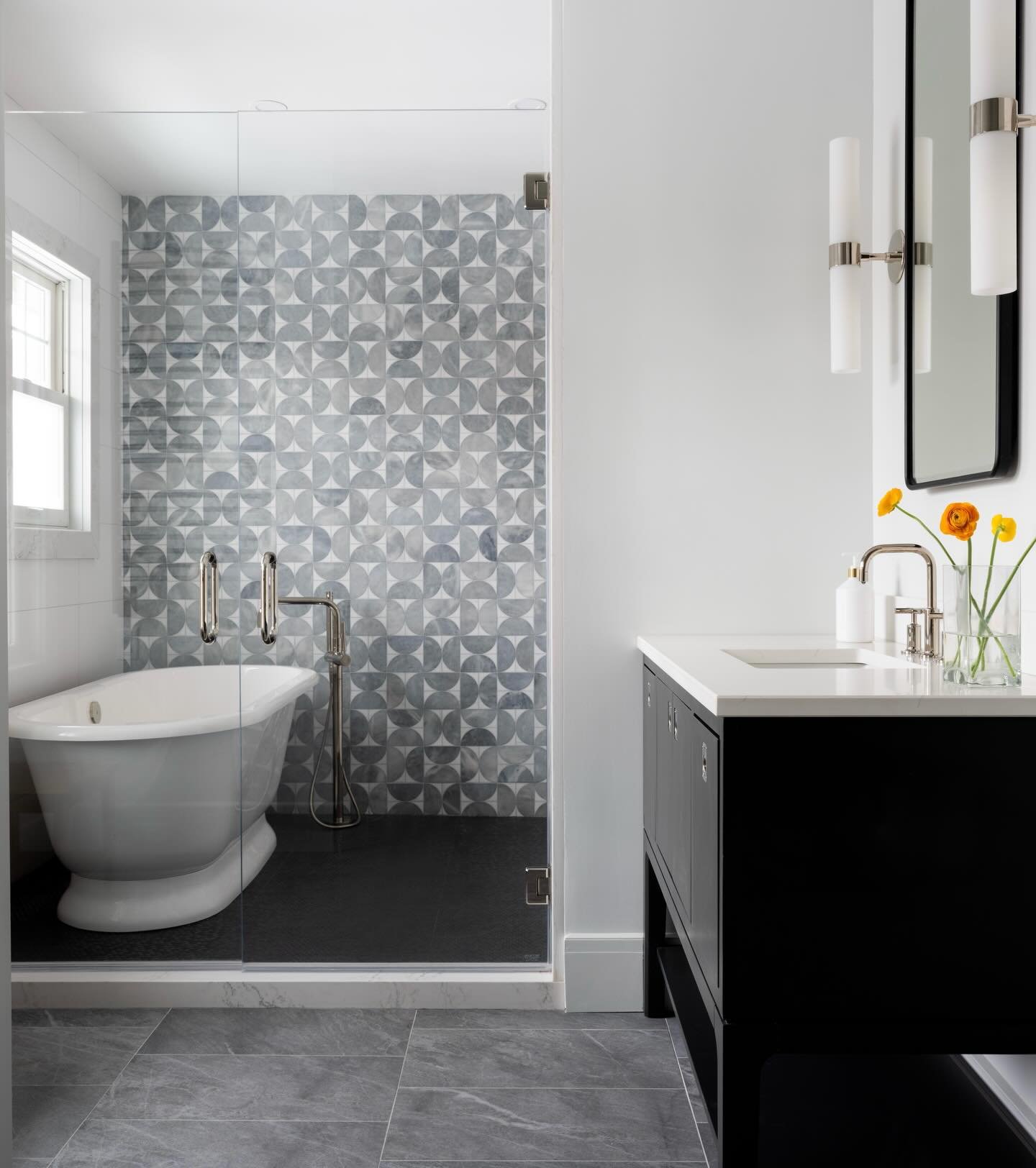 Wet room, heated floors, double shower and vanity, stone wrapped curb and jambs, double glass doors, towel warmer, bidet toilet closet, privacy glass. This bathroom has it all. 

Architect @sweebe_architecture 
Design @sbkinteriorsnj 
Photos @christi