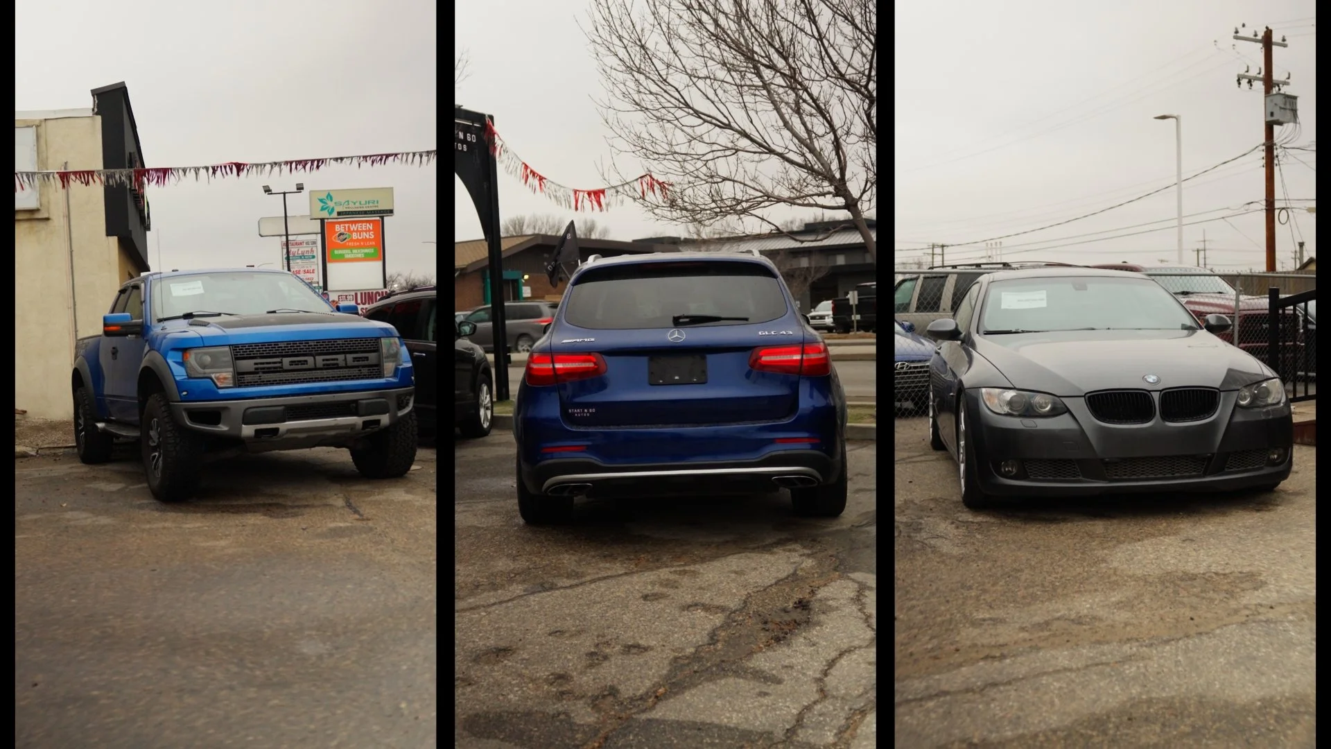 Three cars parked outdoors in a row, with a small business sign in the background. The first car on the left is a blue SUV, the middle car is a blue Mercedes-Benz SUV, and the right car is a gray BMW coupe.